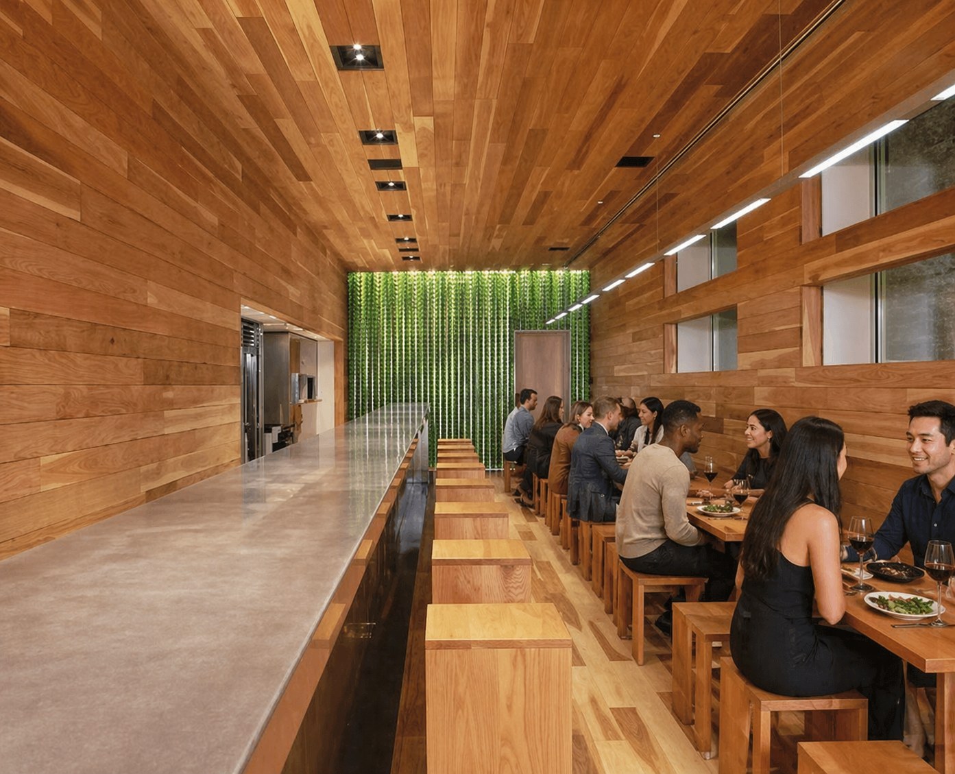 Avec — warm wood interior with communal seating and small plates